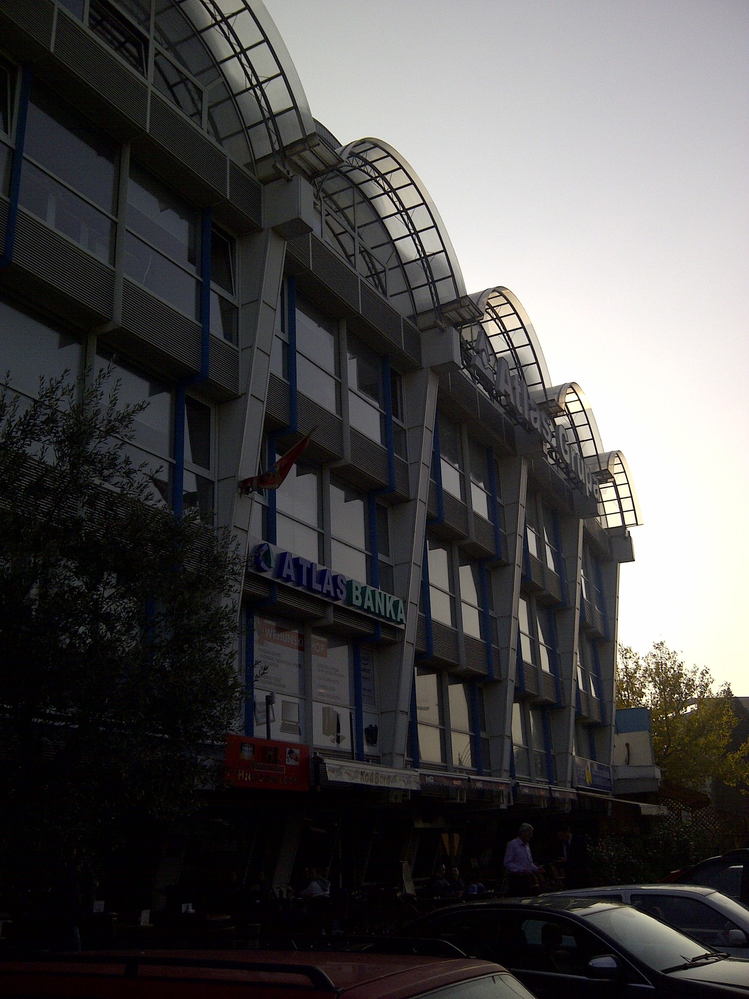 A modern city building above a busy street