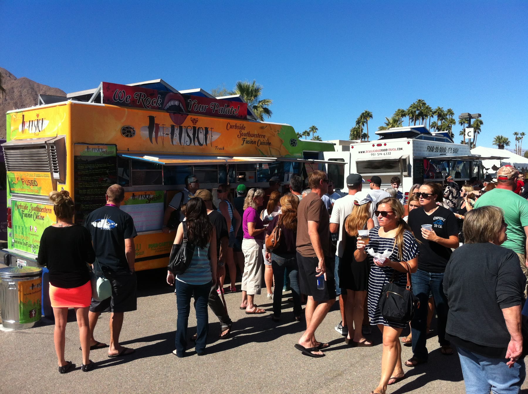 A crowd gathered around food trucks in Palm Springs.
