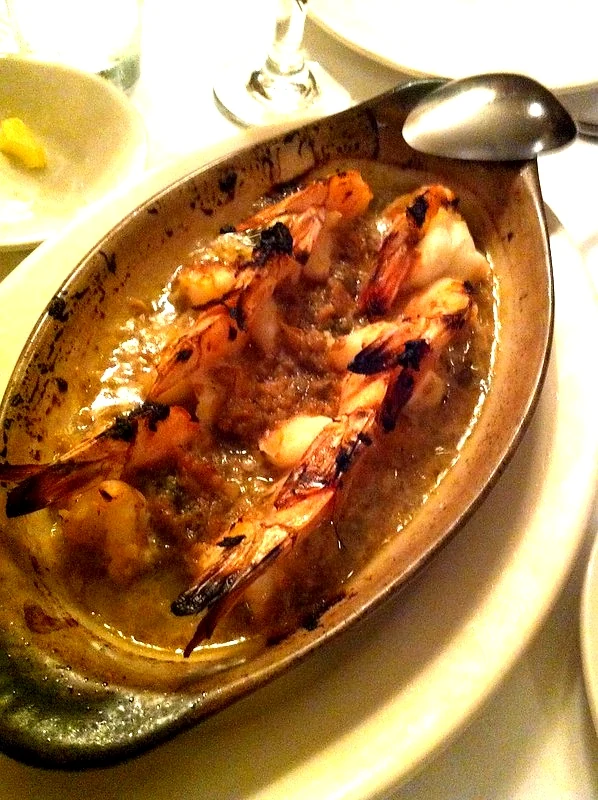 Pietro’s shrimp scampi served in a metal oval dish