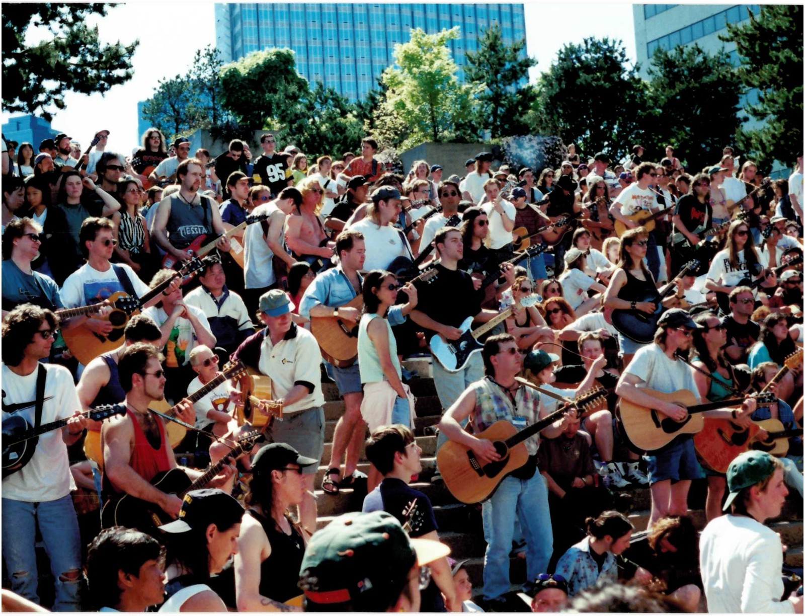 Guitarists gathered at Robson Square for the Music West ’97 Guitar Marathon