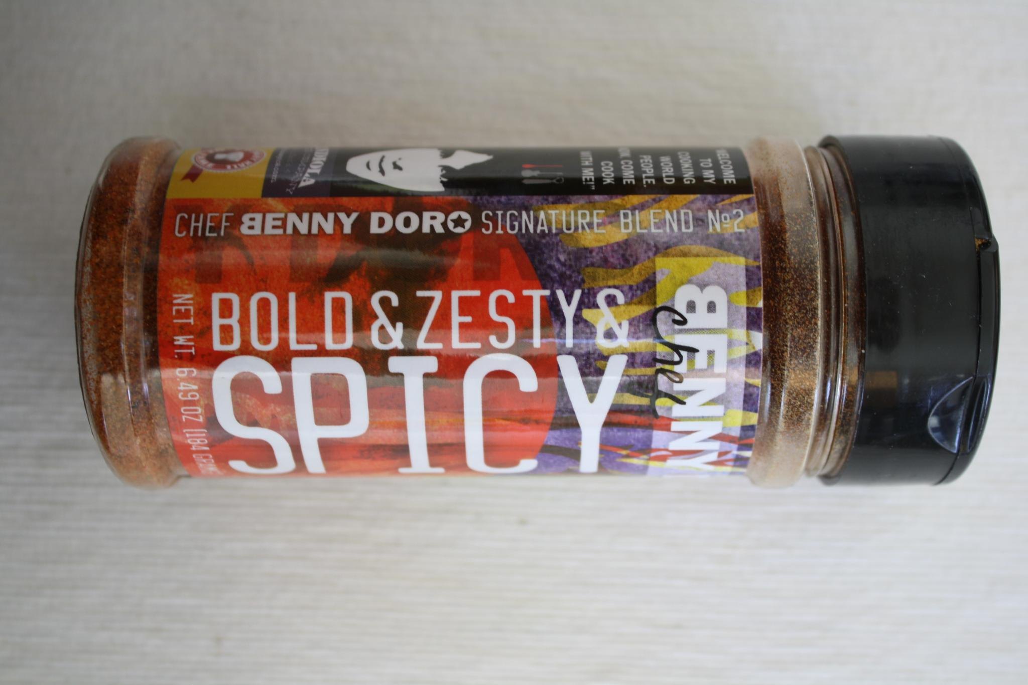A second view of a finished Benny Doro Bold and Zesty Spicy seasoning shaker.