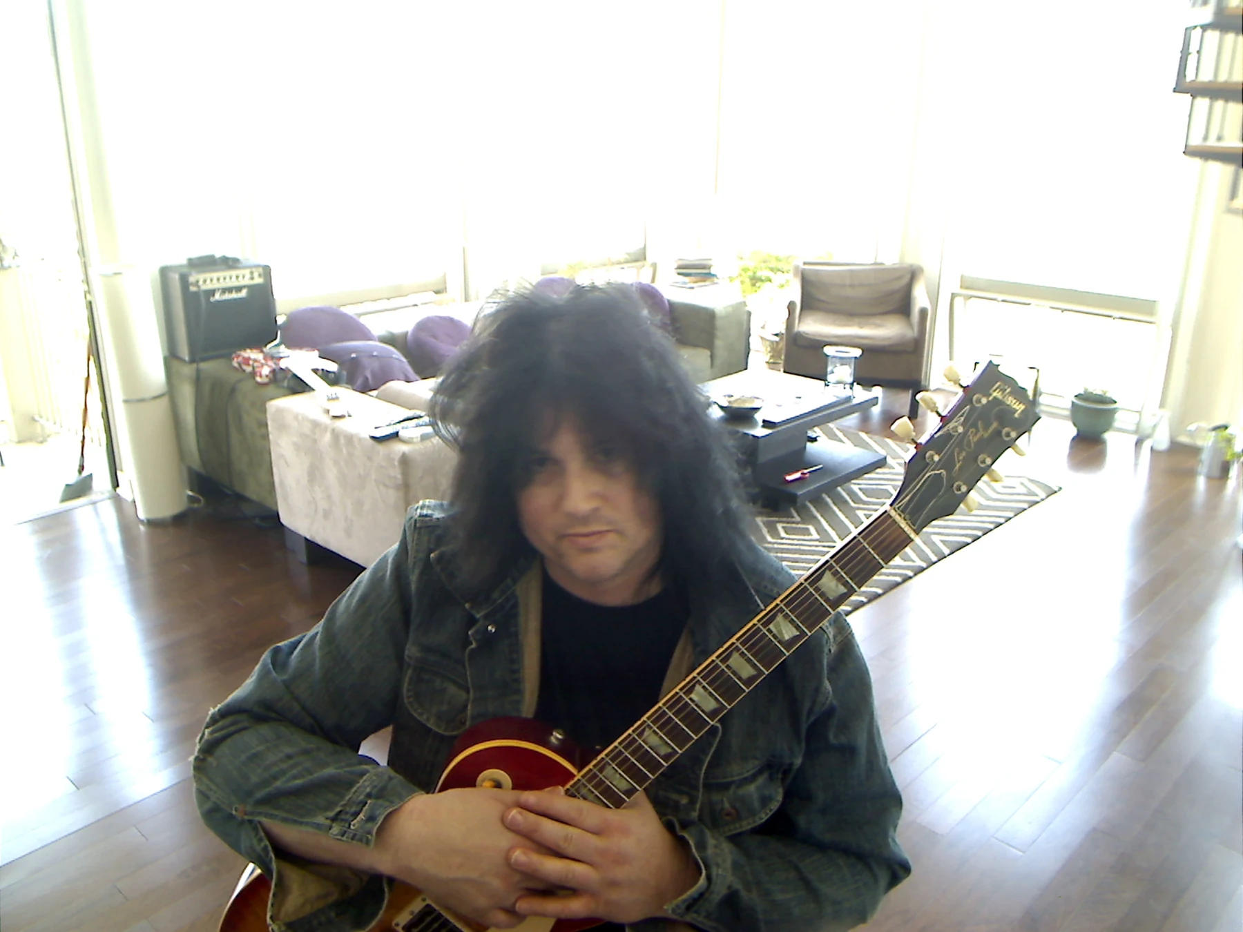 Benny holding the guitar