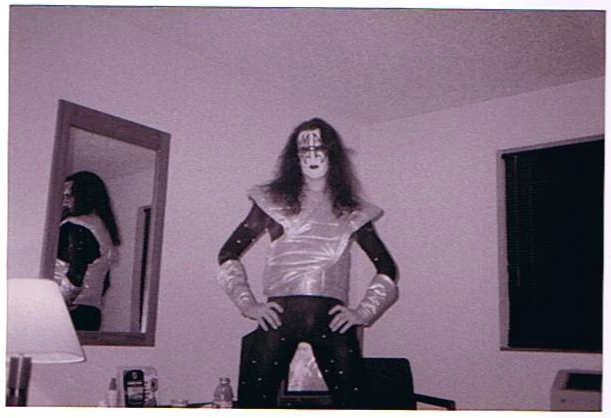 A Black Diamond member standing ready in a hotel room.