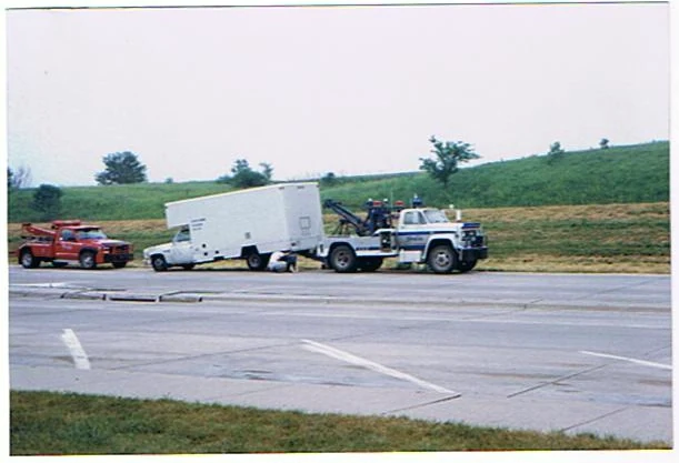 Black Diamond's white equipment truck stopped beside tow vehicles.