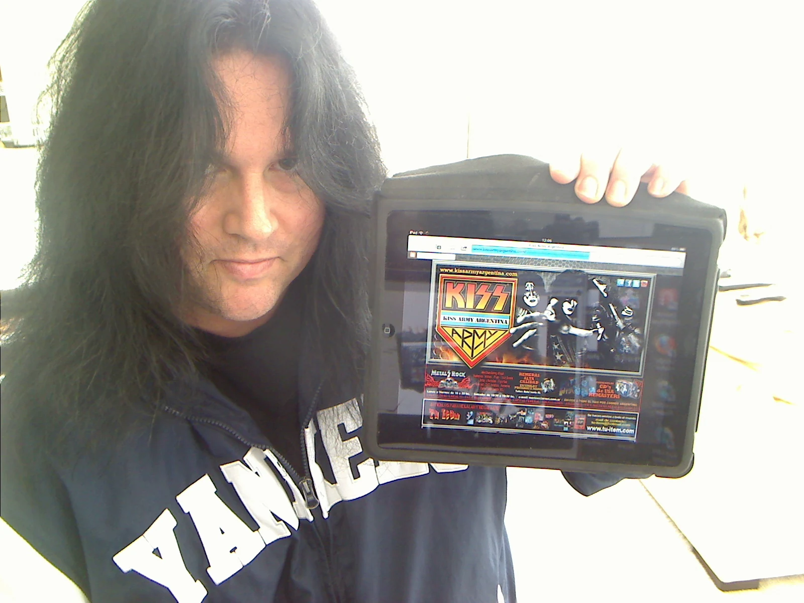 Benny holding the iPad.