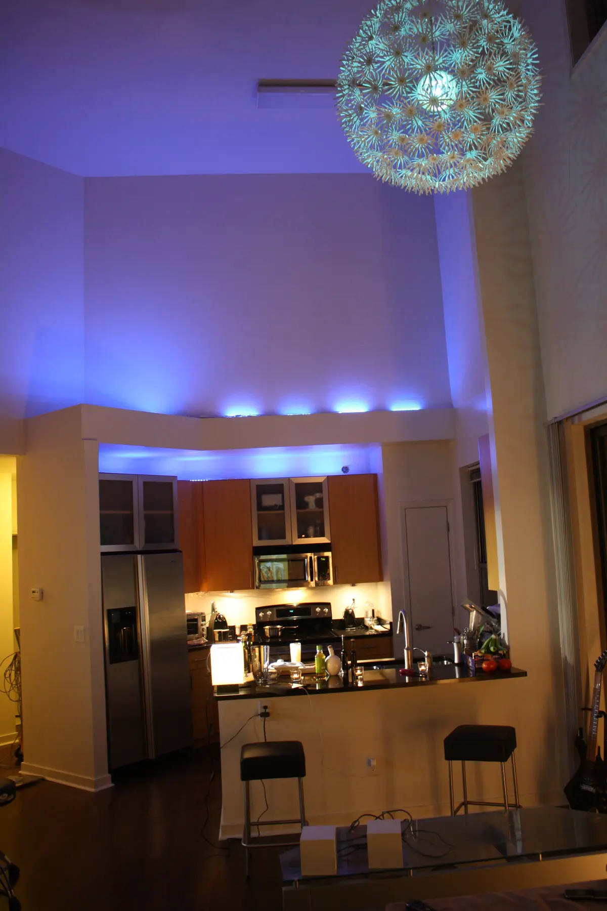The high-ceilinged kitchen and Benny's distinctive lighting.